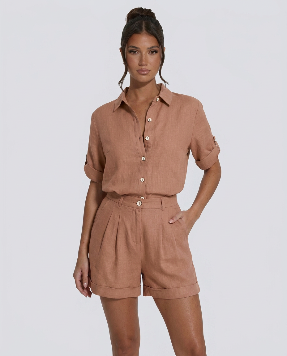 Women's short jumpsuit with button-front fastening