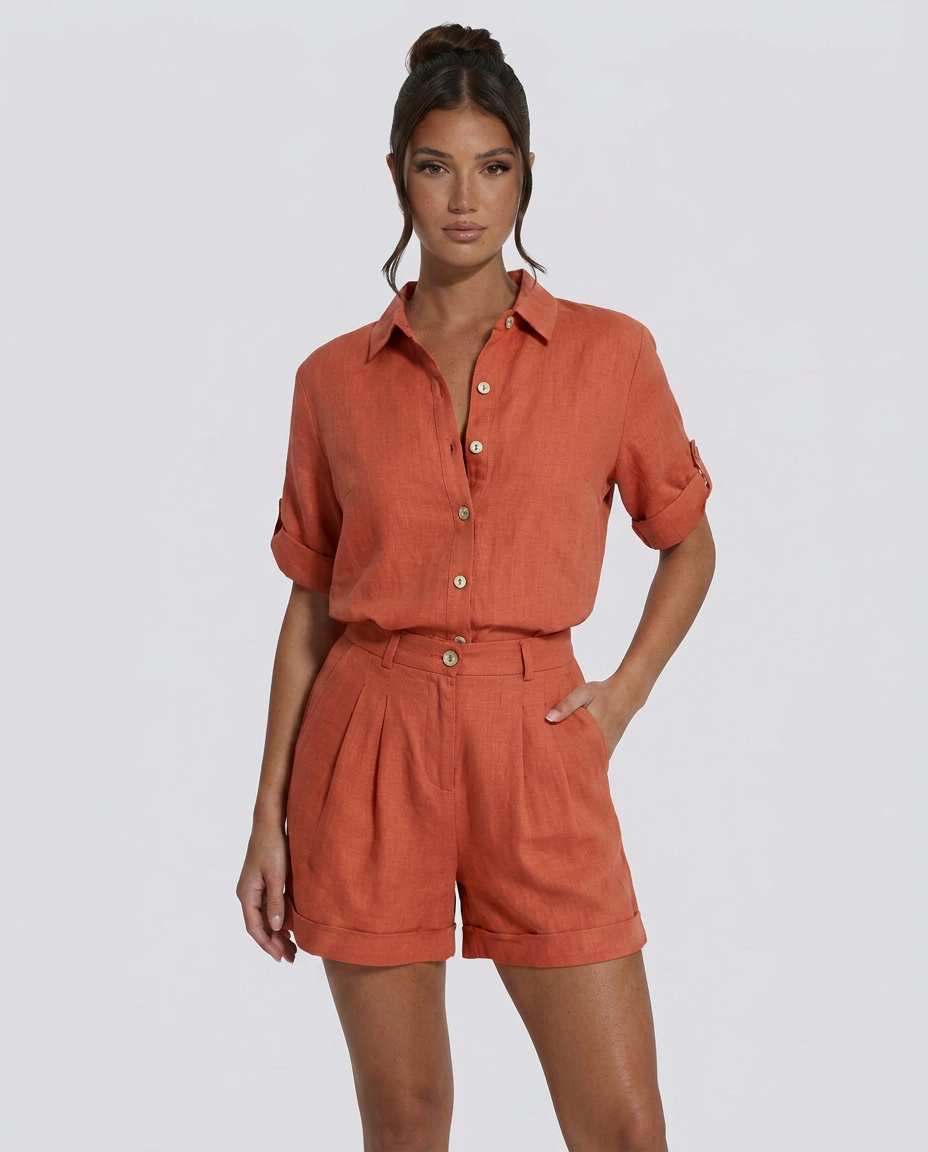 Women's short jumpsuit with button-front fastening