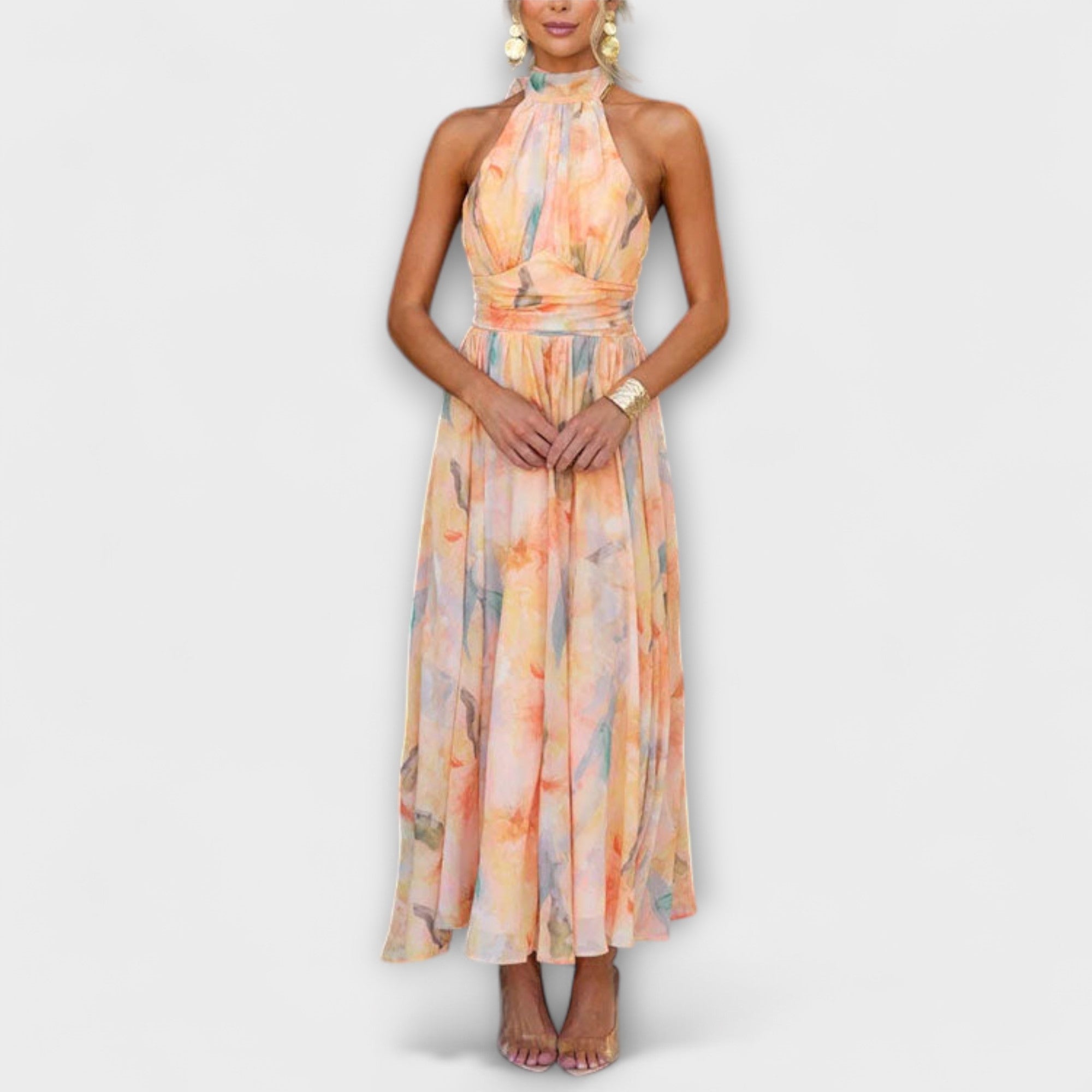 Women's halter neck maxi dress with backless design and print