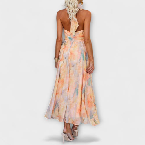 Women's halter neck maxi dress with backless design and print