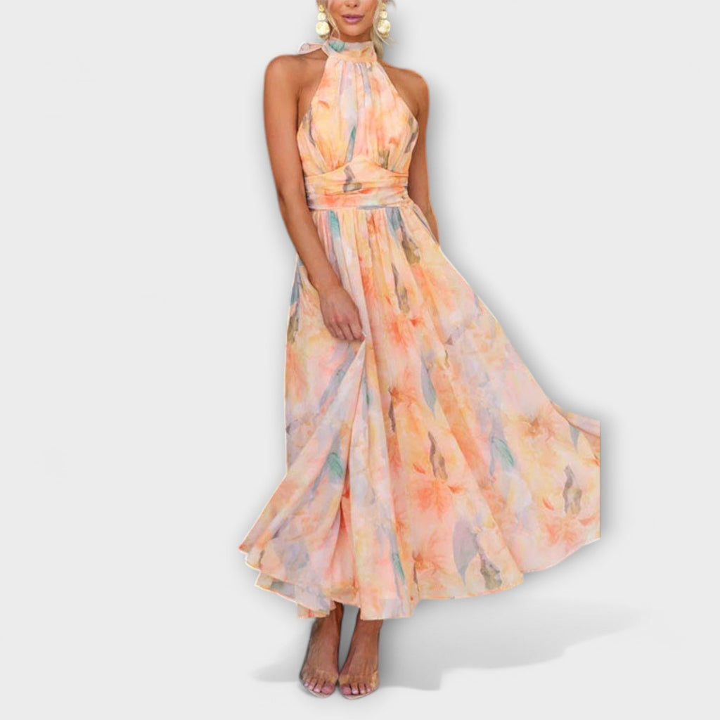 Women's halter neck maxi dress with backless design and print