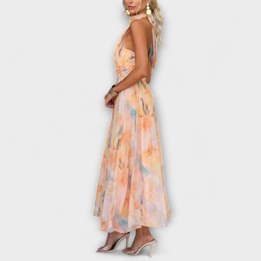 Women's halter neck maxi dress with backless design and print