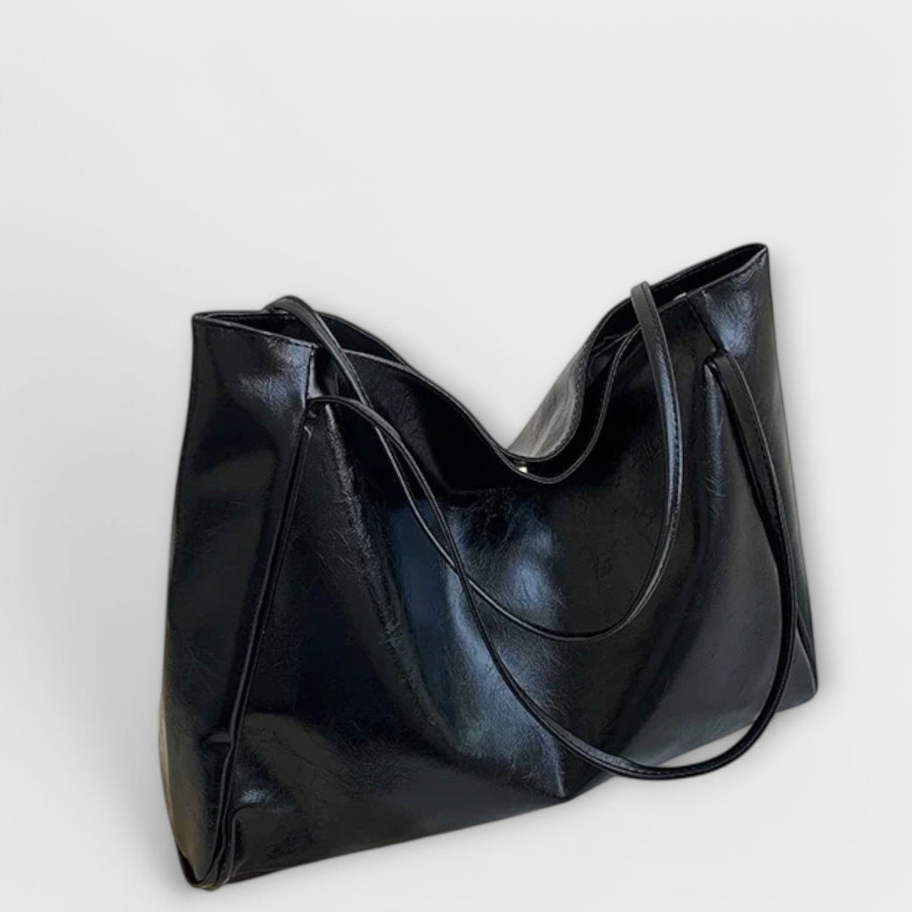 Women's handbag with top handle and structured body