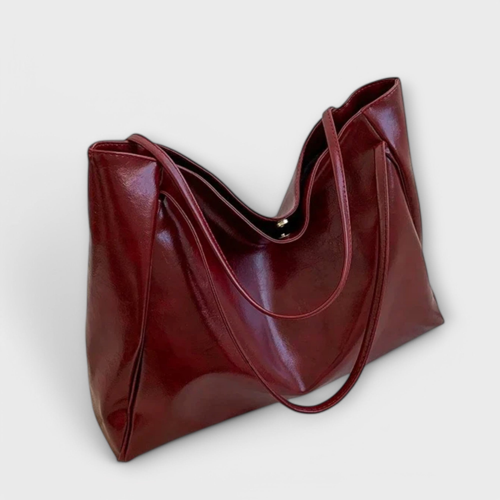 Women's handbag with top handle and structured body