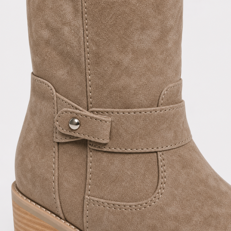 Women's knee-high boots with low heel and side detail