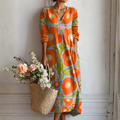 Women's long-sleeve maxi dress with V-neck and floral print