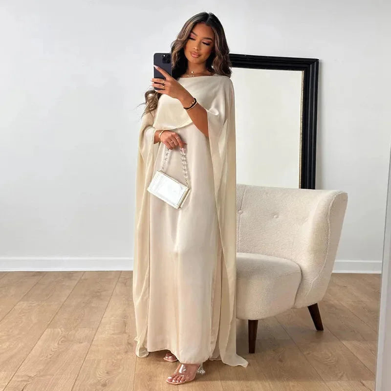 Women's maxi dress with round neck and cape overlay sleeves