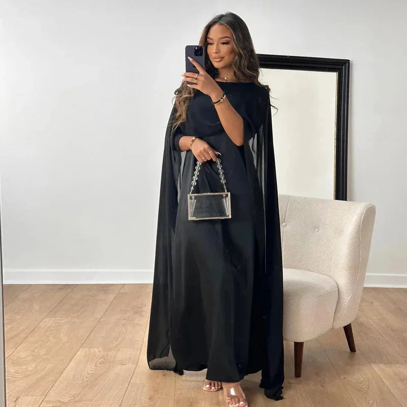 Women's maxi dress with round neck and cape overlay sleeves