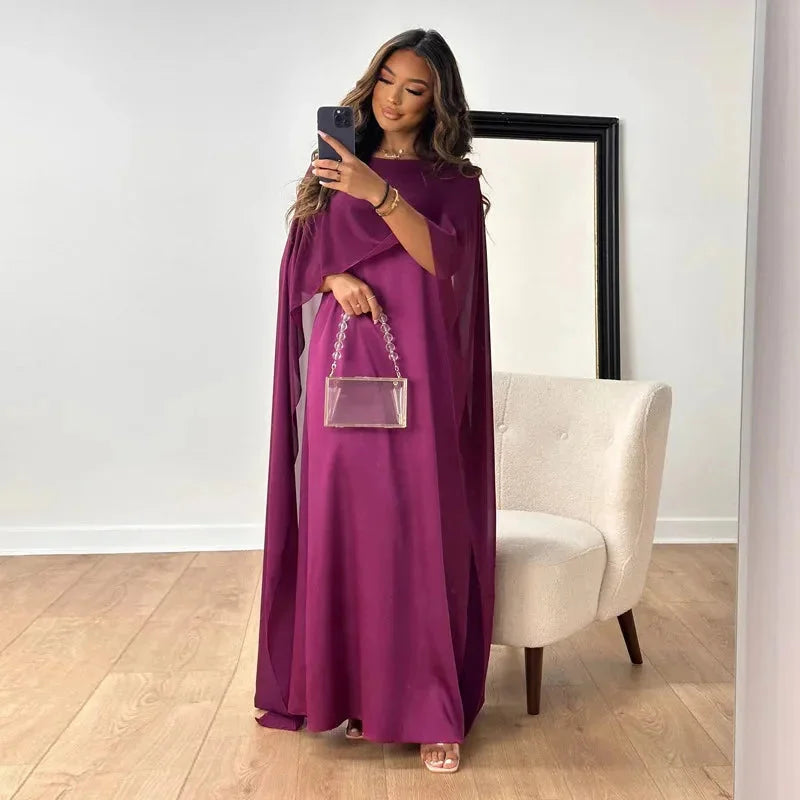 Women's maxi dress with round neck and cape overlay sleeves