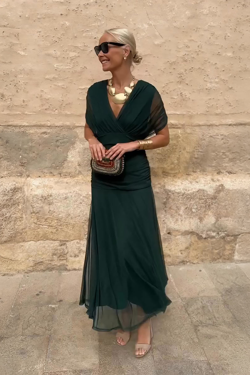 Women's maxi dress with V-neckline and floor-length skirt