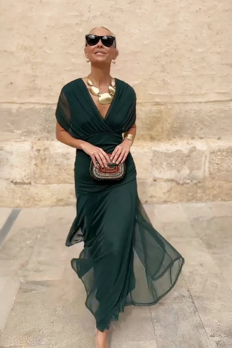 Women's maxi dress with V-neckline and floor-length skirt