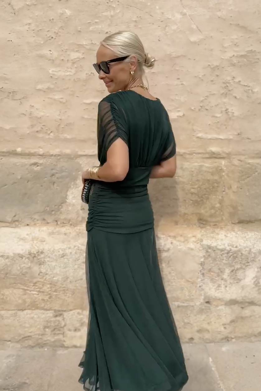 Women's maxi dress with V-neckline and floor-length skirt