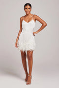 Women's mini dress with feather trim and spaghetti straps