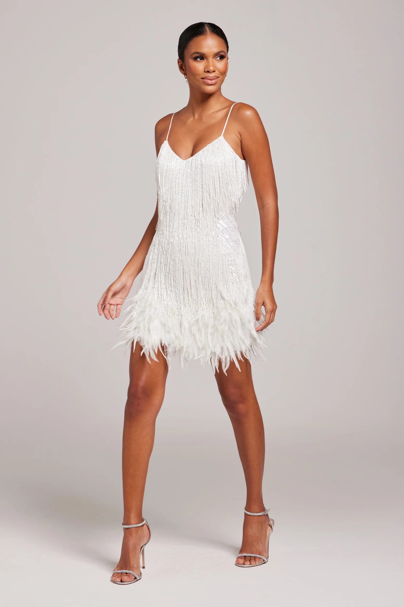 Women's mini dress with feather trim and spaghetti straps