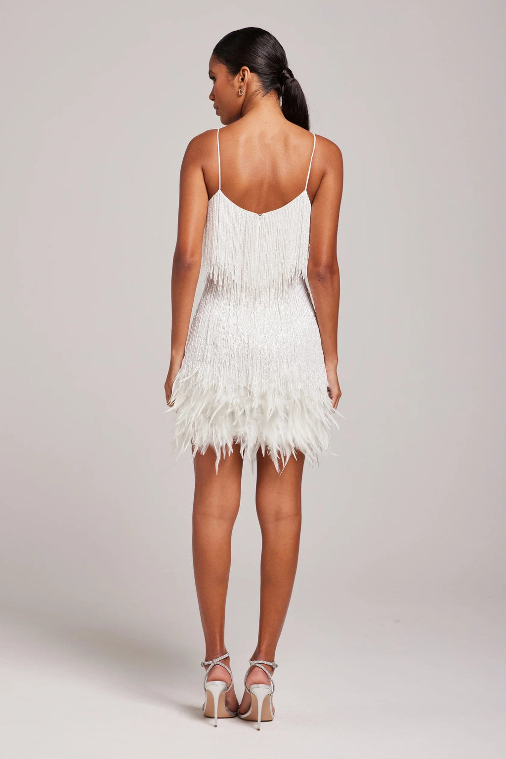 Women's mini dress with feather trim and spaghetti straps