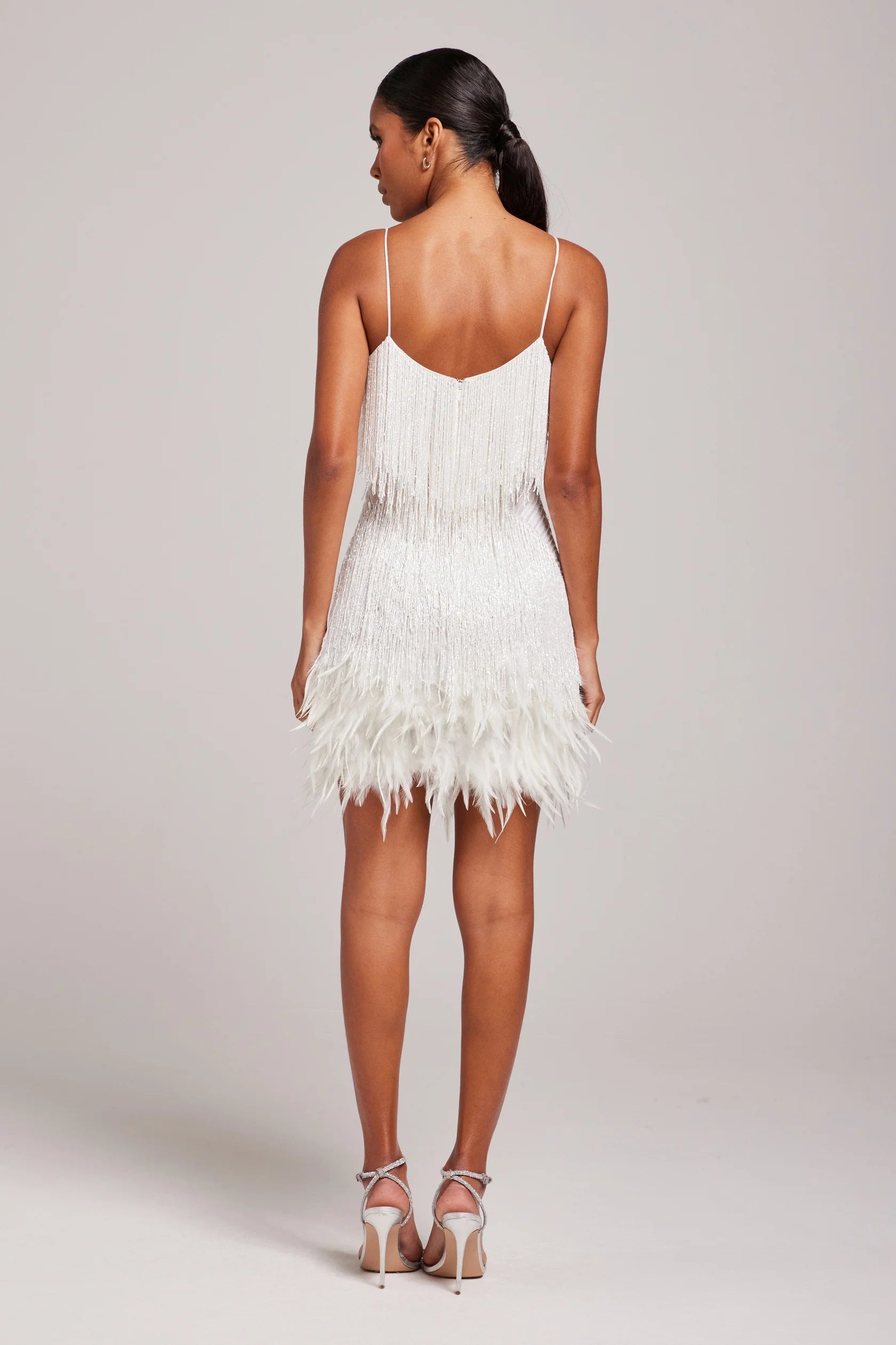 Women's mini dress with feather trim and spaghetti straps