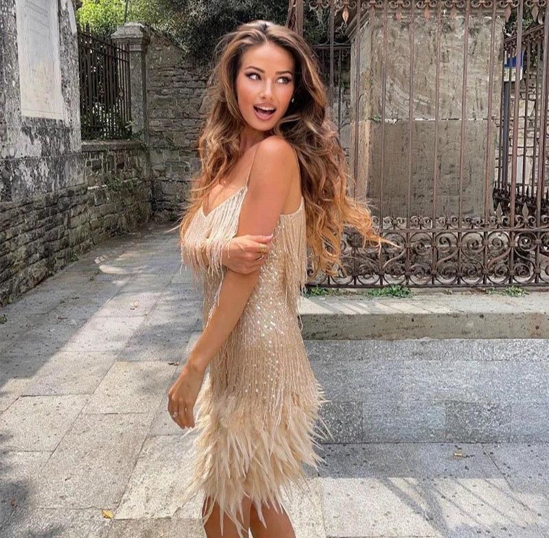 Women's mini dress with feather trim and spaghetti straps
