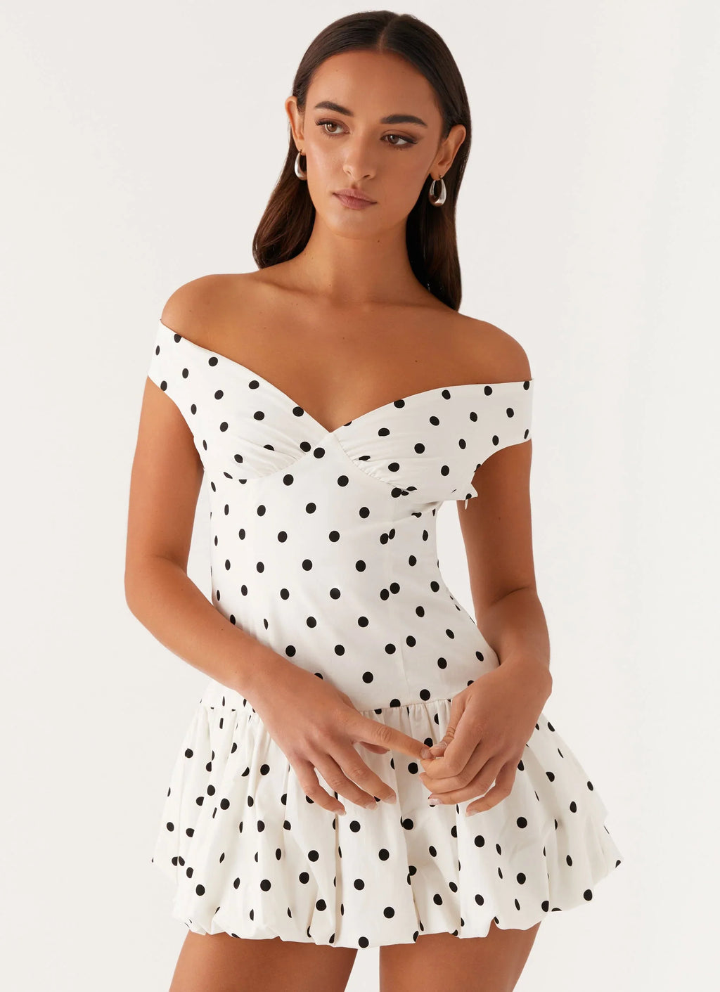 Women's off-shoulder peplum mini dress with polka dot pattern