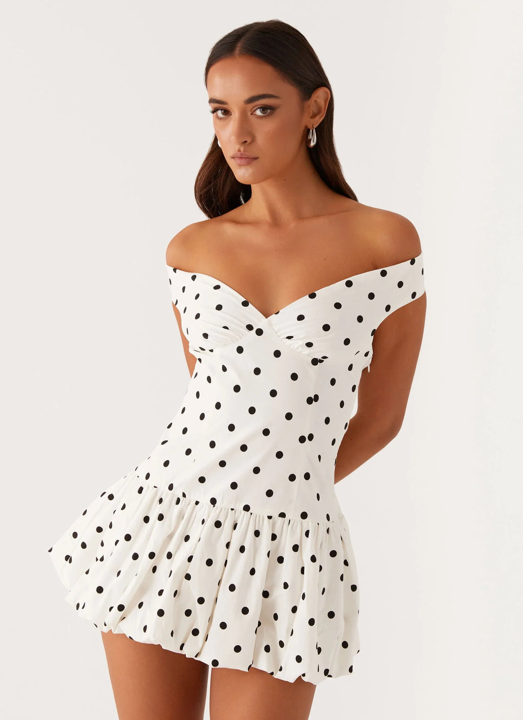 Women's off-shoulder peplum mini dress with polka dot pattern