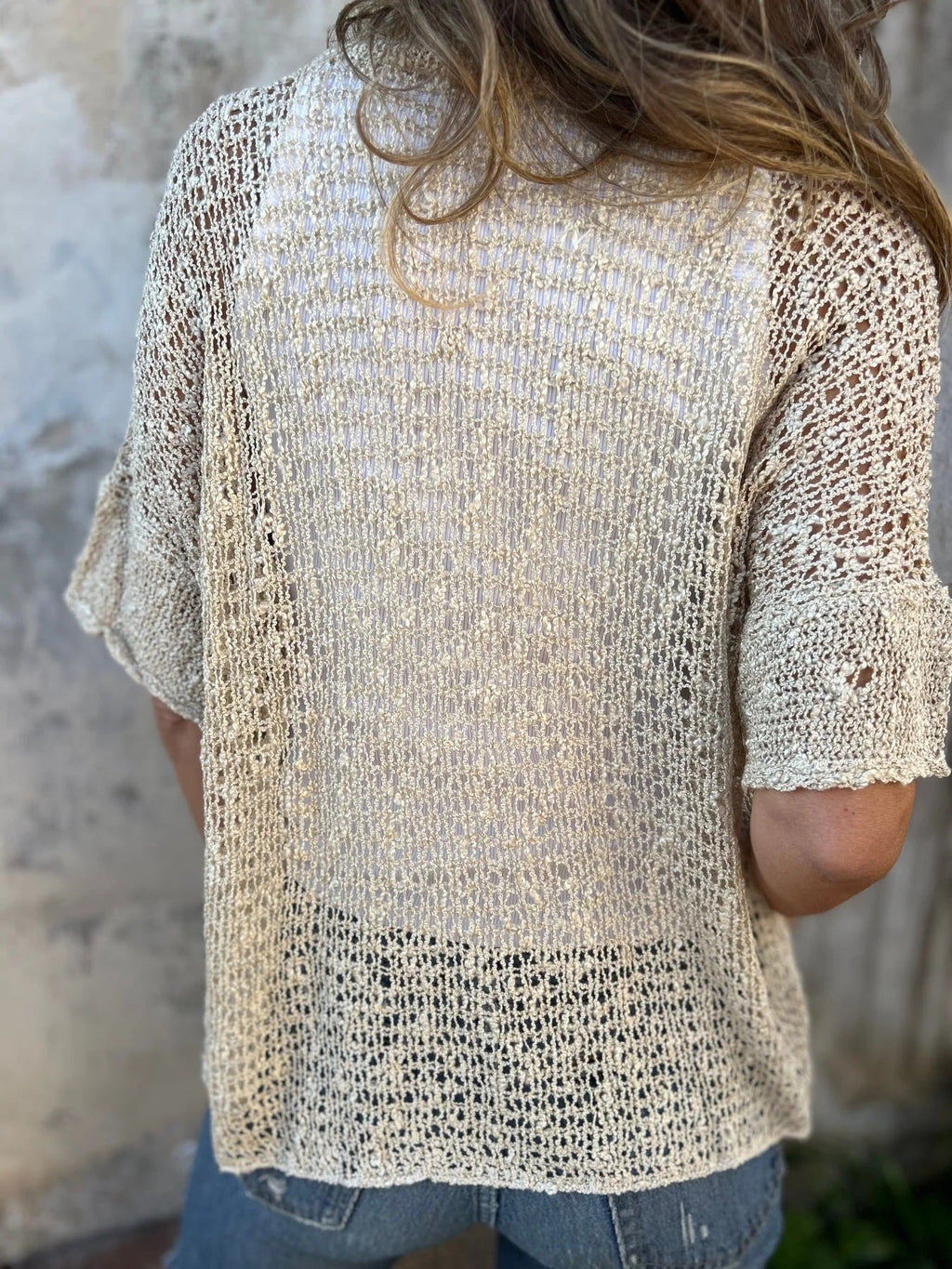 Women's open-knit gilet with ajouré pattern