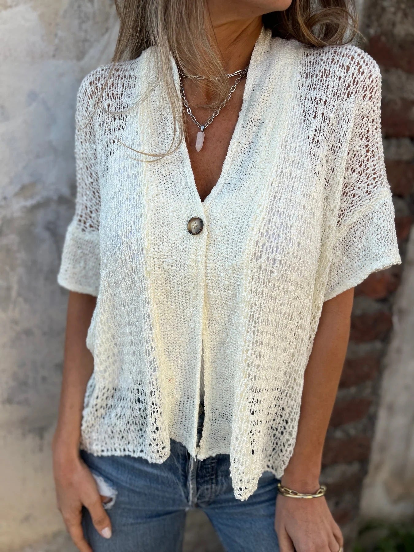 Women's open-knit gilet with ajouré pattern