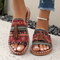 Women's open-toe slide sandals with tassel detail