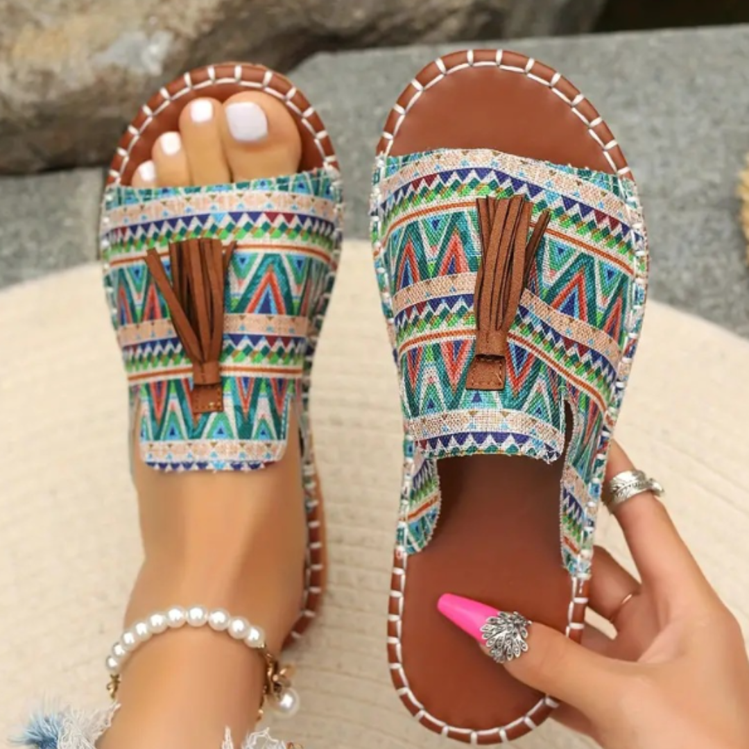 Women's open-toe slide sandals with tassel detail