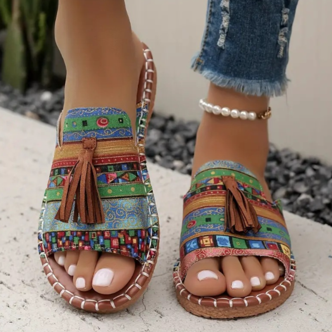 Women's open-toe slide sandals with tassel detail