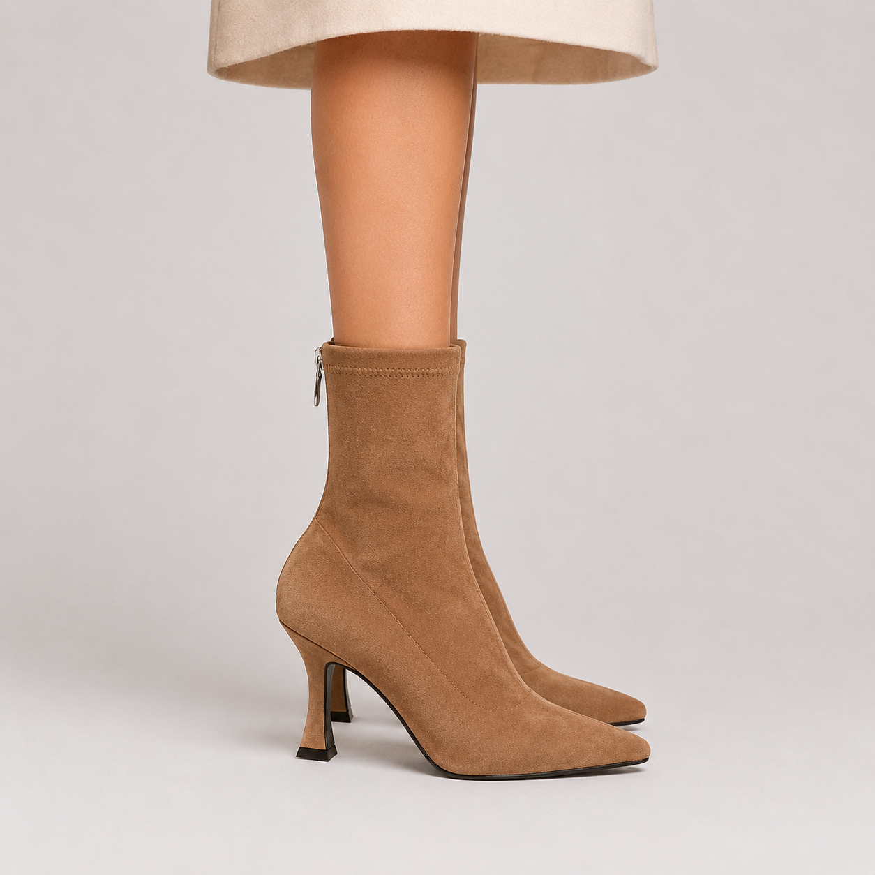 Women's pointed-toe sock ankle boots with sculpted heel