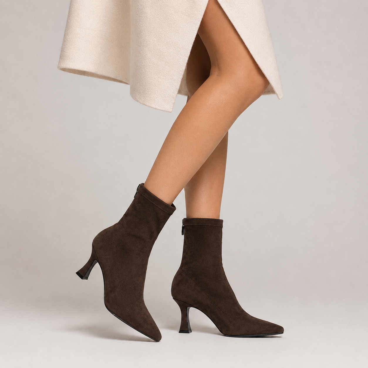 Women's pointed-toe sock ankle boots with sculpted heel