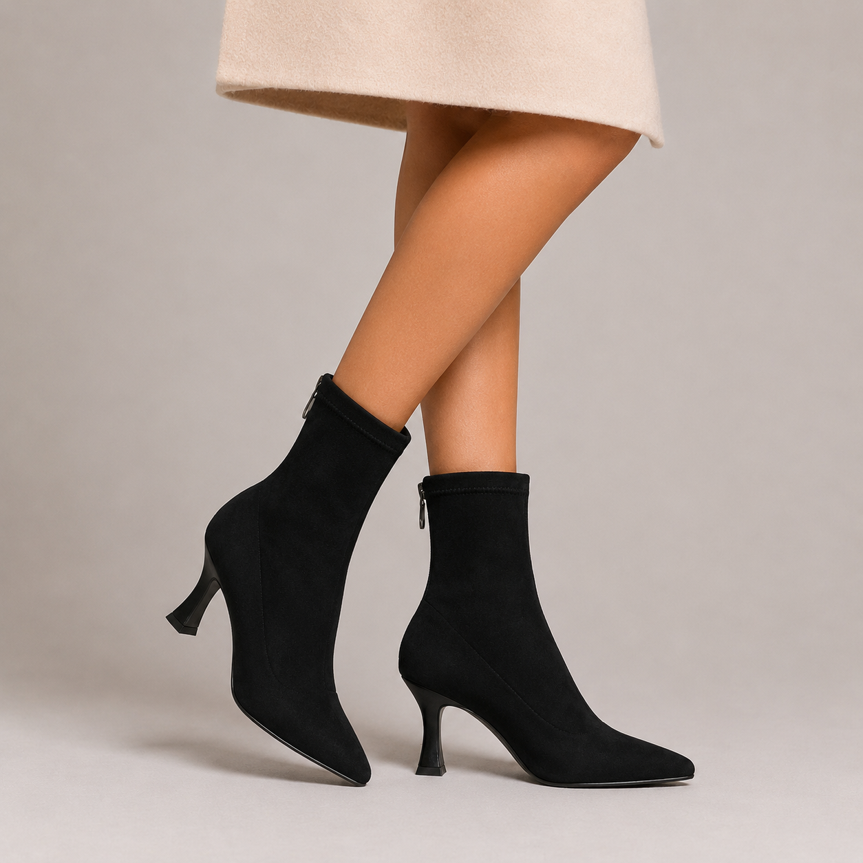 Women's pointed-toe sock ankle boots with sculpted heel