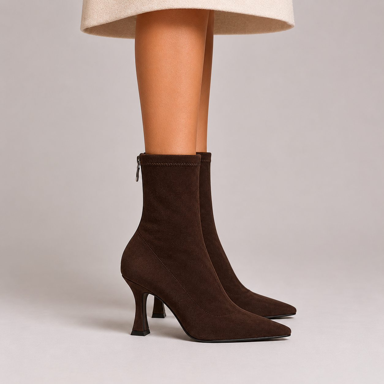 Women's pointed-toe sock ankle boots with sculpted heel