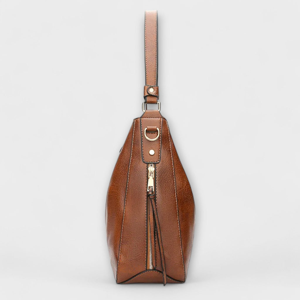 Women's shoulder bag with top handle and adjustable strap