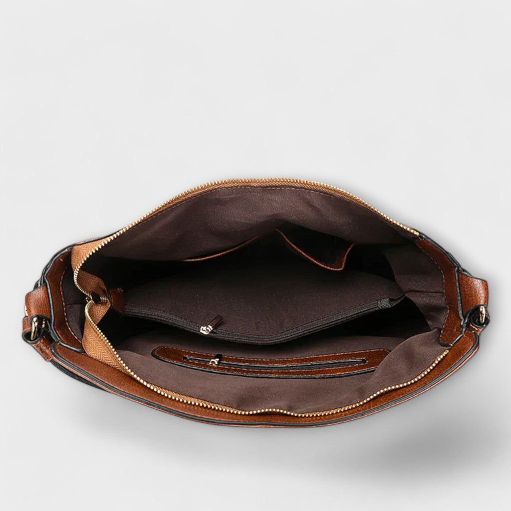 Women's shoulder bag with top handle and adjustable strap