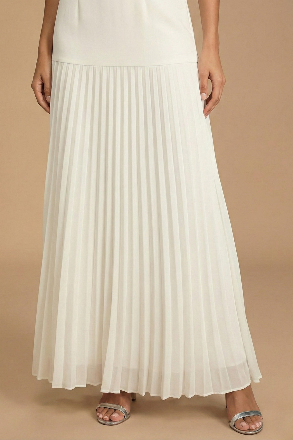 Women's sleeveless maxi dress with boat neck and pleated skirt