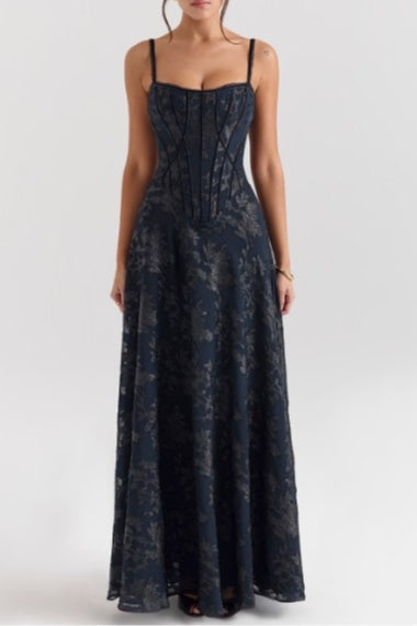 Women's spaghetti strap dress with floral print and flowing skirt
