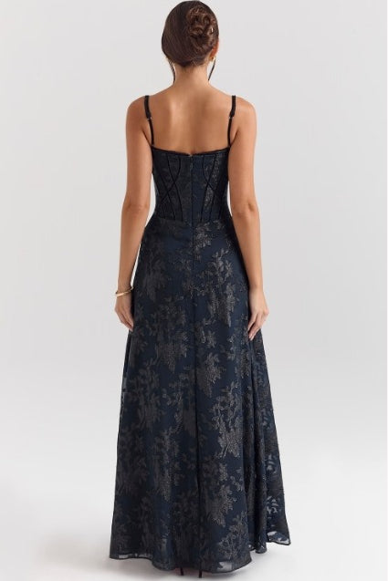 Women's spaghetti strap dress with floral print and flowing skirt